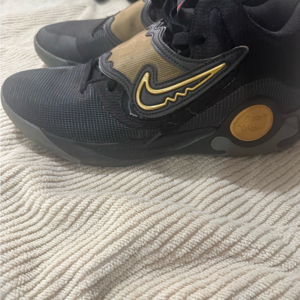 Nike Kids Black and Gold Sneakers